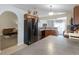 View of the kitchen featuring stainless steel appliances and wood cabinets at 1112 Spruce Ridge Ct, Minneola, FL 34715