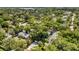 Aerial view of the property showcasing lush landscaping and neighborhood at 1217 Kenwood Ave, Winter Park, FL 32789