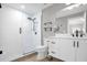 Modern bathroom with a glass-enclosed shower and sleek white vanity at 1217 Kenwood Ave, Winter Park, FL 32789