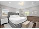 Spacious bedroom with a large bed, neutral colors, and windows for natural light at 1217 Kenwood Ave, Winter Park, FL 32789