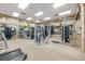 Well-equipped gym featuring modern exercise machines and ample space for a comprehensive workout routine at 12527 Floridays Resort Dr # E104, Orlando, FL 32821
