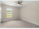 Standard bedroom with a ceiling fan and a great view from the window at 12756 Sw 80 St, Dunnellon, FL 34432