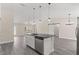 Kitchen island featuring a stainless steel dishwasher, faucet, and granite countertops at 12756 Sw 80 St, Dunnellon, FL 34432