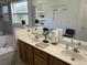 Bright bathroom features a double sink vanity, and separate tub and shower at 13000 Sandy Pine Ln, Clermont, FL 34711