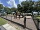 Community playground featuring slides, climbers, and ample space for to play safely at 13000 Sandy Pine Ln, Clermont, FL 34711