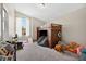 Cozy bedroom featuring a fun loft bed with a chalkboard and play area at 13691 Crystal River Dr, Orlando, FL 32828