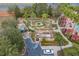 Aerial view of a winding mini golf course adjacent to the community pool and amenities area at 1428 Solana Cir, Davenport, FL 33897