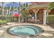Private outdoor hot tub near the community pool area, perfect for unwinding and enjoying leisure time at 1428 Solana Cir, Davenport, FL 33897