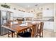 Bright kitchen with stainless appliances and a table to seat four is perfect for cooking and dining at 1428 Solana Cir, Davenport, FL 33897