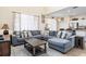 Comfortable and spacious living room with a large sectional couch and great natural light at 1428 Solana Cir, Davenport, FL 33897
