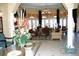 Inviting lobby area with comfortable seating, elegant décor, and ample natural light at 1428 Solana Cir, Davenport, FL 33897