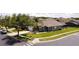 Charming single-Gathering home with well-manicured lawn, landscaping, and attached garage at 150 Barefoot Beach Way, Kissimmee, FL 34746