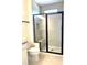Modern bathroom with glass shower and ceramic tile at 15119 Grove Lake Dr, Winter Garden, FL 34787