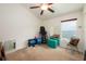 Functional bedroom with ample space for fitness equipment and natural light from a window at 1646 Song Sparrow Ct, Sanford, FL 32773
