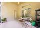 Screened porch with seating area, plants, and ample light at 1646 Song Sparrow Ct, Sanford, FL 32773