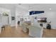 Bright, open concept living area with modern furnishings and ample natural light at 189 Blackstone Creek Rd, Groveland, FL 34736