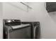 Modern laundry room features an LG washer and dryer set in a monochromatic style at 1891 Bryan Ave, Winter Park, FL 32789