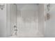 A walk-in shower features a handheld shower head and a built-in seat at 19 Hemlock Terrace Way, Ocala, FL 34472