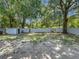 Large backyard with partial fence line and storage shed at 2109 Hartwell Ave, Sanford, FL 32771