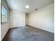 Bedroom with a double door closet and window at 2109 Hartwell Ave, Sanford, FL 32771