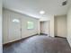Simple bedroom with new carpet, a closet, and natural light at 2109 Hartwell Ave, Sanford, FL 32771