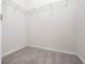 Carpeted walk-in closet with wire shelving at 2249 Litchfield Loop, Deland, FL 32720