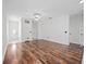 Spacious living room featuring hard wood floors and light walls at 2249 Litchfield Loop, Deland, FL 32720