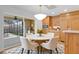 Dining area with a modern table and chairs with a view of the screened-in lanai at 2250 Blossomwood Dr, Oviedo, FL 32765