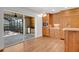 Eat-in kitchen featuring hardwood cabinets, stainless steel appliances, and sliding glass doors to the patio at 2250 Blossomwood Dr, Oviedo, FL 32765