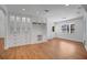 Spacious living room with custom built-ins, recessed lighting, and hardwood floors at 2250 Blossomwood Dr, Oviedo, FL 32765