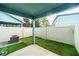 The fenced back yard has low-maintenance artificial grass, offering a clean and private outdoor space at 2337 Bexley Pl, Casselberry, FL 32707