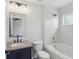 Well-lit bathroom featuring a bathtub and a single sink vanity with granite countertop at 2337 Bexley Pl, Casselberry, FL 32707
