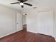 Bedroom featuring hardwood floors, a ceiling fan, and closet space at 2337 Bexley Pl, Casselberry, FL 32707