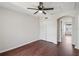 Bedroom featuring hardwood floors, a ceiling fan, and a closet with double doors at 2337 Bexley Pl, Casselberry, FL 32707