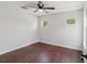 Bedroom featuring hardwood floors, a ceiling fan, and dual windows for natural light at 2337 Bexley Pl, Casselberry, FL 32707