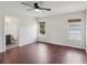 Spacious bedroom with hardwood floors, ceiling fan and two windows at 2337 Bexley Pl, Casselberry, FL 32707