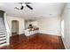 Spacious living room with hardwood floors, recessed lighting, and bar seating area at 2337 Bexley Pl, Casselberry, FL 32707