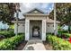 The community pool house is surrounded by landscaping and greenery and provides amenities for residents at 2337 Bexley Pl, Casselberry, FL 32707
