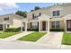 Charming two-story townhome with lush green lawn at 2409 Silver Palm Dr, Kissimmee, FL 34747