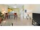 Bright living room with a breakfast bar and a view into the kitchen, perfect for a modern lifestyle at 2409 Silver Palm Dr, Kissimmee, FL 34747