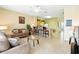 Open-concept living room and kitchen area, perfect for entertaining and comfortable living at 2409 Silver Palm Dr, Kissimmee, FL 34747