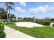 Outdoor sand volleyball court with well-maintained net, perfect for a friendly game at 2409 Silver Palm Dr, Kissimmee, FL 34747