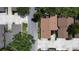 Birds-eye view of the property showcasing the roof, landscaping, and surrounding neighborhood at 271 Raintree Dr, Casselberry, FL 32707
