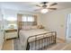 Warm bedroom with natural light and a cozy bed at 271 Raintree Dr, Casselberry, FL 32707