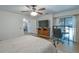 Bright bedroom with a ceiling fan and a desk at 271 Raintree Dr, Casselberry, FL 32707