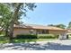 Beautiful single-story home with manicured lawn and landscaping, creating a welcoming curb appeal at 271 Raintree Dr, Casselberry, FL 32707