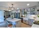 This kitchen features a large island, stainless steel appliances, and updated cabinets at 271 Raintree Dr, Casselberry, FL 32707