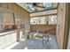 Cozy sunroom features a skylight, large windows, and comfortable seating, perfect for relaxation at 271 Raintree Dr, Casselberry, FL 32707