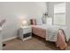 Cozy bedroom with soft carpet, a plush bed, and bright natural light at 2733 Big Timber Dr, Kissimmee, FL 34758