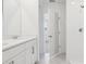 Bright bathroom features double sinks, white countertops and a large mirror at 2770 Virginia Pine Dr, Bartow, FL 33830